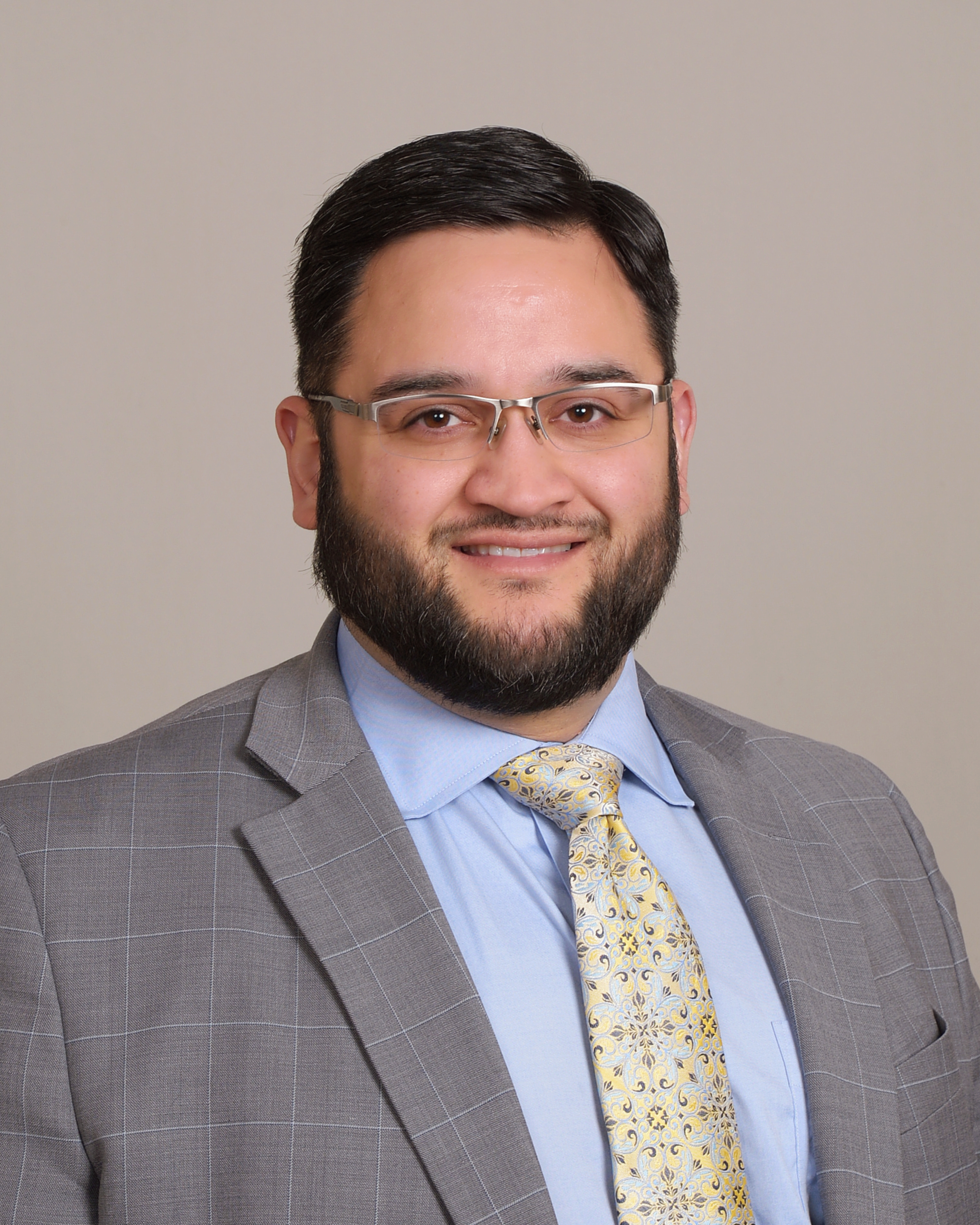 Headshot of Samuel Martin Fuentes, President of Blue Roots Professional Services LLC